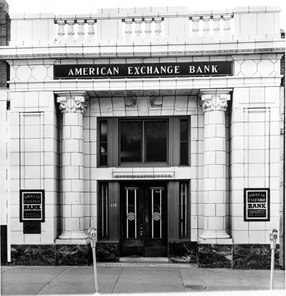 Old store front image of American Exchange Bank